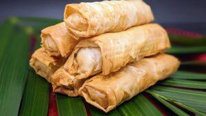 Crispy Cheese Cigars on palm frond